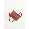 The shoulder strap triangle bag, brown leather