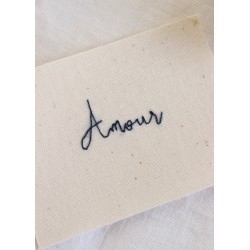 Embroided words "Amour"