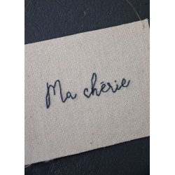 Embroided words "Ma chérie"